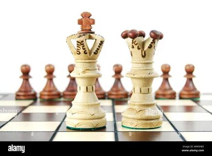 ...chess pieces on chess board showing concept for success and power - WWXH85