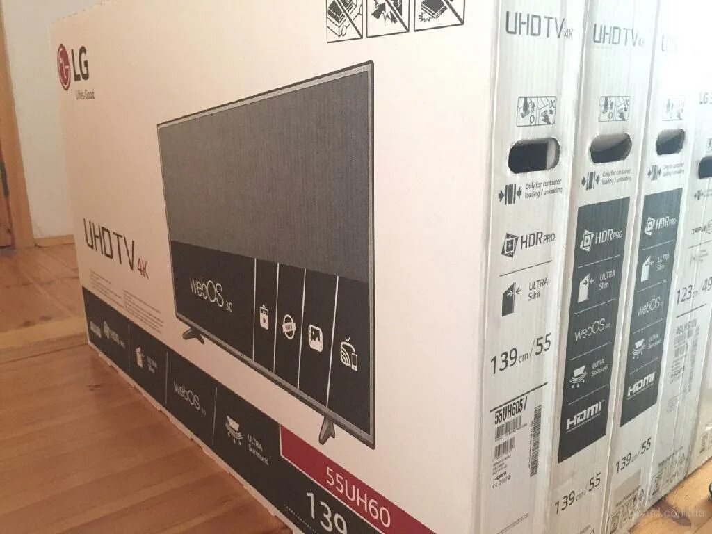 Размеры упаковки телевизора. LG 55cxrla упаковка. Телевизор LG c1 крышка. Упакованный телевизор. LG телевизор коробка le.