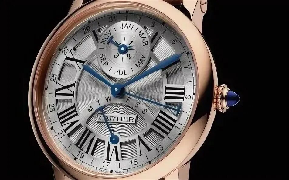Карма ые часы. Часы Cartier Genuine Leather. Cartier 2955 Swiss made. Cartier Perpetual Calendar. Часы Картье мужские.