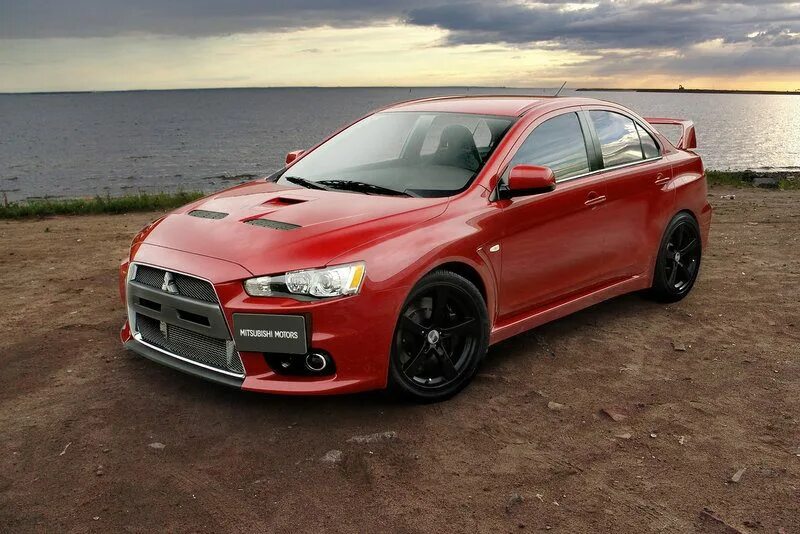 Эва митсубиси. Лансер 10 Эволюшн. Lancer EVO 10. Митсубиси Лансер Эволюшн 10 красный. Митсубиши Лансер 10.