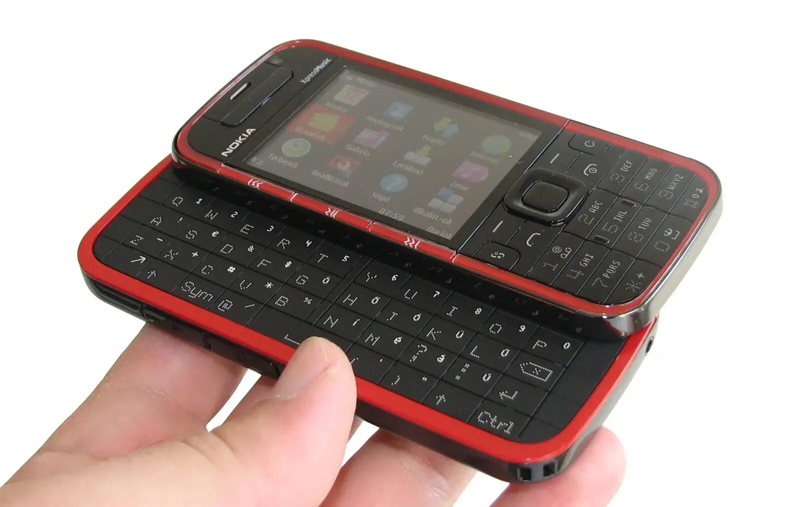 Телефон с клавиатурой. Nokia 5320 xpressmusic. nokia 5730. 5730 xpressmusic. nokia 5730 с клавиатурой.