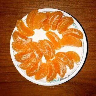 Положить апельсин