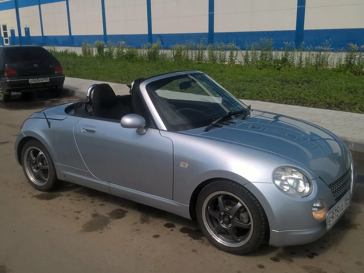 Daihatsu Copen 2003. Родстер Daihatsu Copen. Daihatsu Copen i, 2003. Daihatsu Copen 2002. Дайхатсу 0.7