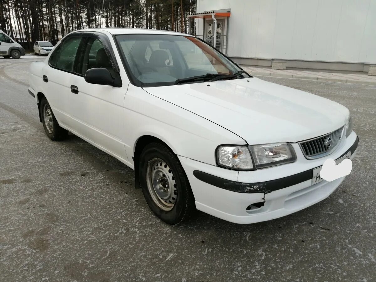 Санни бел. Nissan Sunny 2002. Ниссан Санни в15 белый. Ниссан Санни 2002 белый. Ниссан Санни 2001.