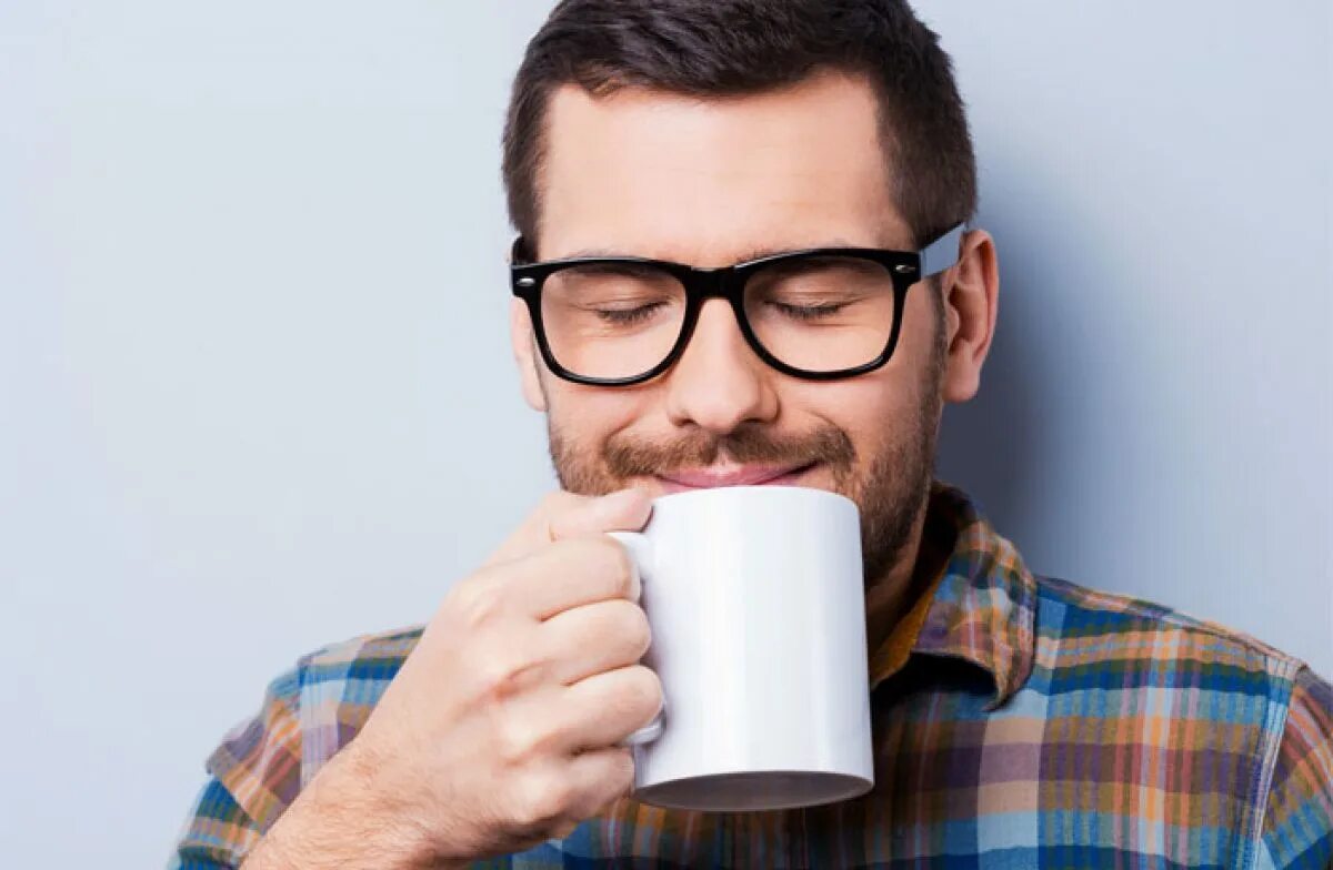 Man Drink Coffee. Мужчина с соком. Человек держит кофе боком. Man drinking Coffee.