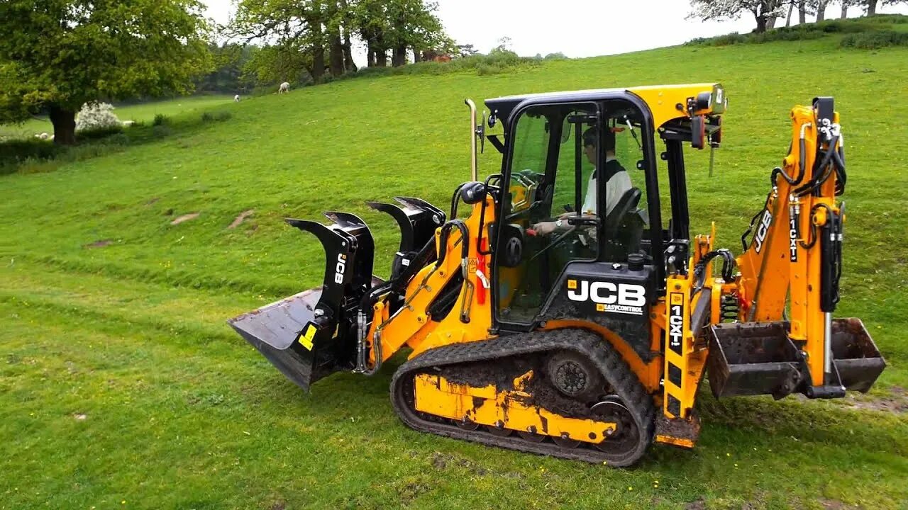 JCB 1cx гусеничный. Экскаватор-погрузчик JCB 1cx. Погрузчик JCB 1cx. Мини экскаватор погрузчик JCB 1cx.