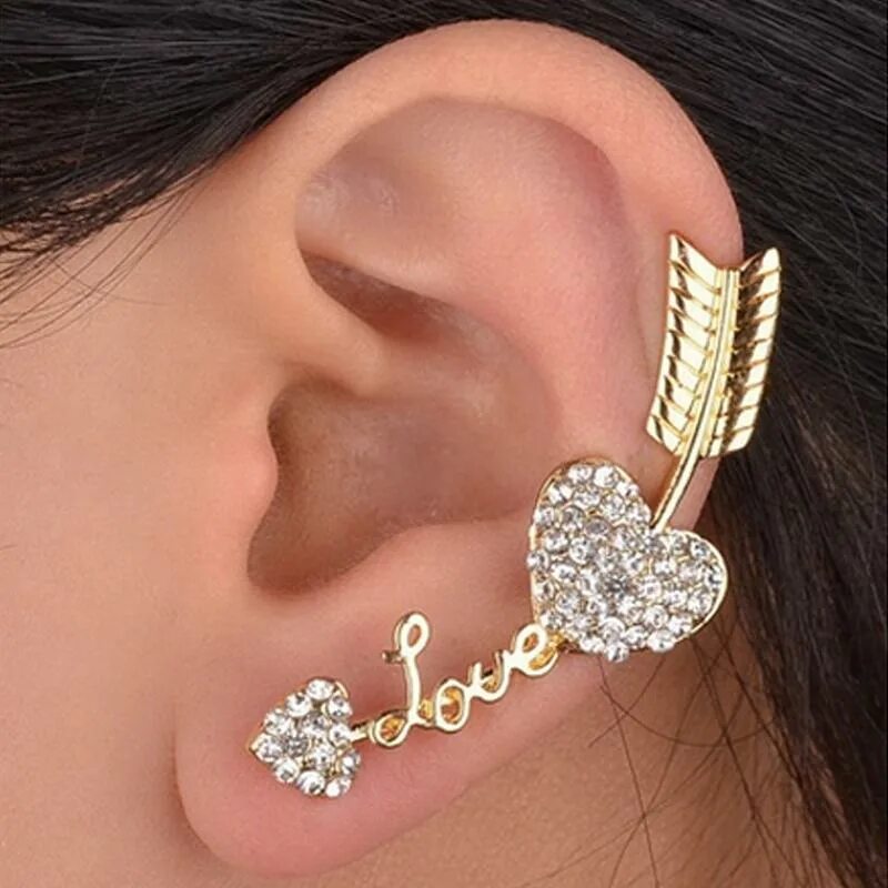 Каффы на уши. Серьги haidy ear. Клипсы для ушей. Ухо женское с сережкой. Золотые серьги дубайское золото.