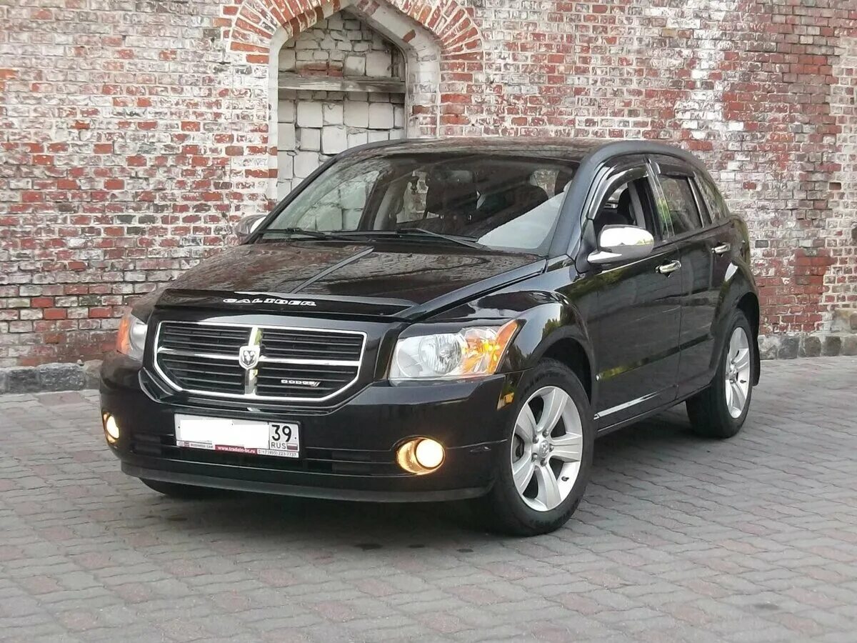 Dodge caliber 2.0. Машина Додж Калибр. Dodge Caliber 2012. Додж Калибр 2011. Додж Калибер 2012.