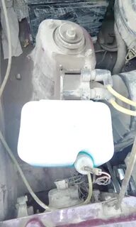 Поменять бачок омывателя