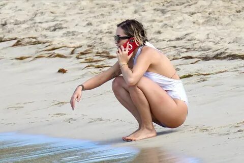 Rita Ora in a White Swimsuit on the Beach in Saint Barthélemy Island 12/21/...