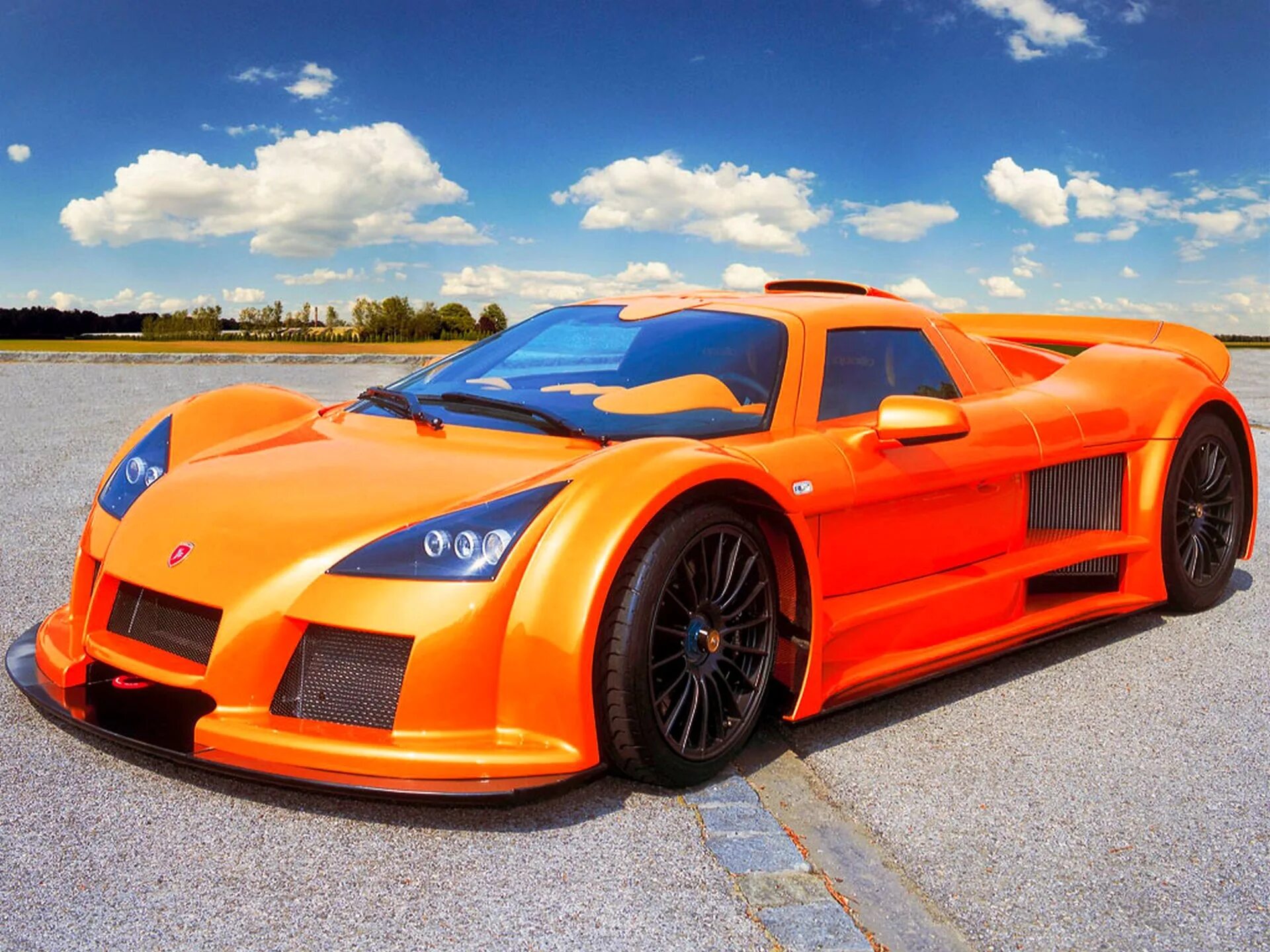 Включи сильно машина. Gumpert Apollo. Gumpert Apollo машина. Gumpert Apollo Sport 2010. Gumpert Apollo Sport 2022.