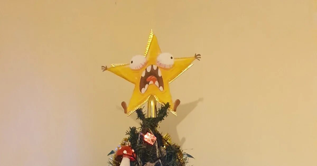 Звезда села. Смешная звезда на елку. Орущая звезда на ёлке. Кричащая звезда на елке. Новогодняя звезда на елку.
