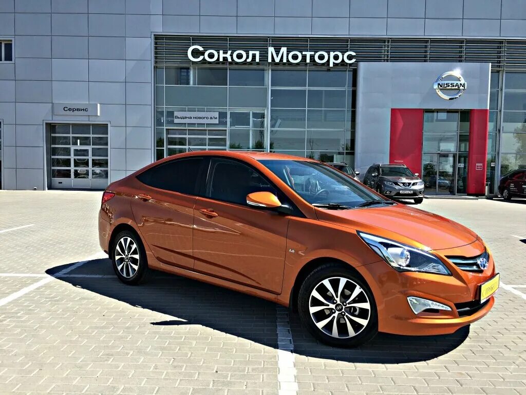 Купить хендай солярис в перми. Hyundai Solaris 2015 1,6 оранж. Hyundai Solaris 2015 седан. Hyundai Solaris rw5. Hyundai Solaris 1 Рестайлинг оранжевый.