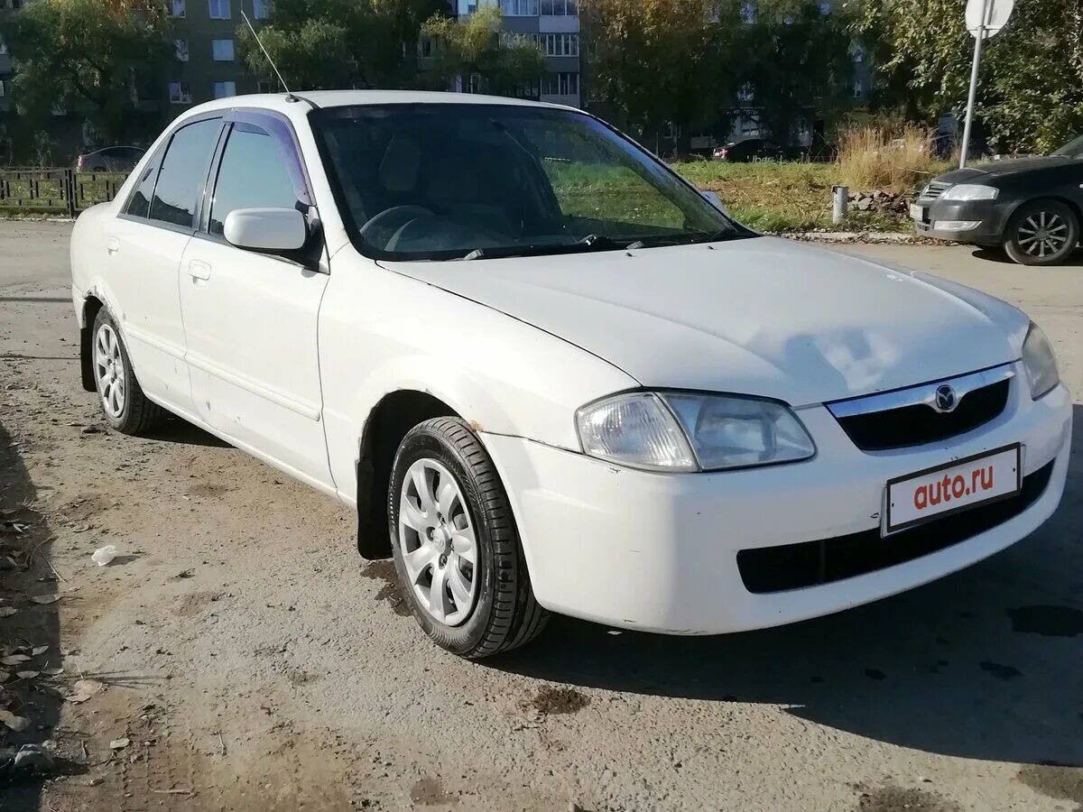 Mazda familia 2/0. Mazda familia 2000 год. Mazda familia 2000 фото. мазда фамилия 2000 белая. Mazda familia 2000.