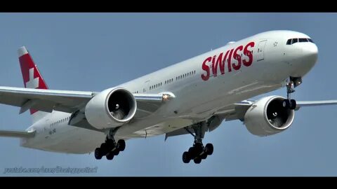 VIDEO Swiss Int'l Airlines Boeing 777-300 Landing & Takeoff in Mon...
