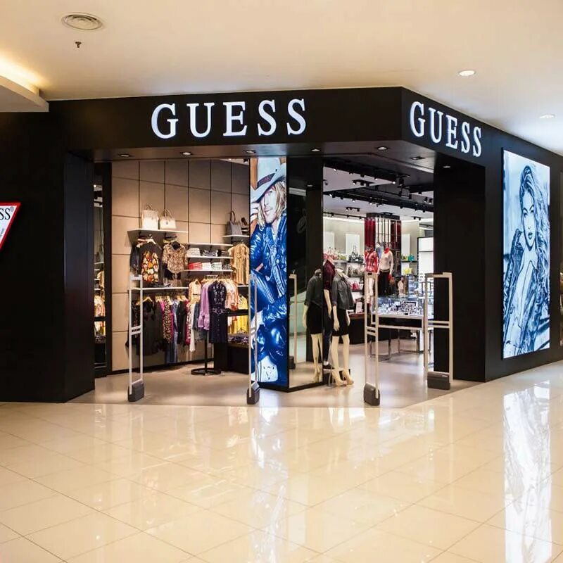 Малайзия аутлет guess. Фирма Гуесс. Витрина guess. Гесс магазин. Сайт интернет магазина guess