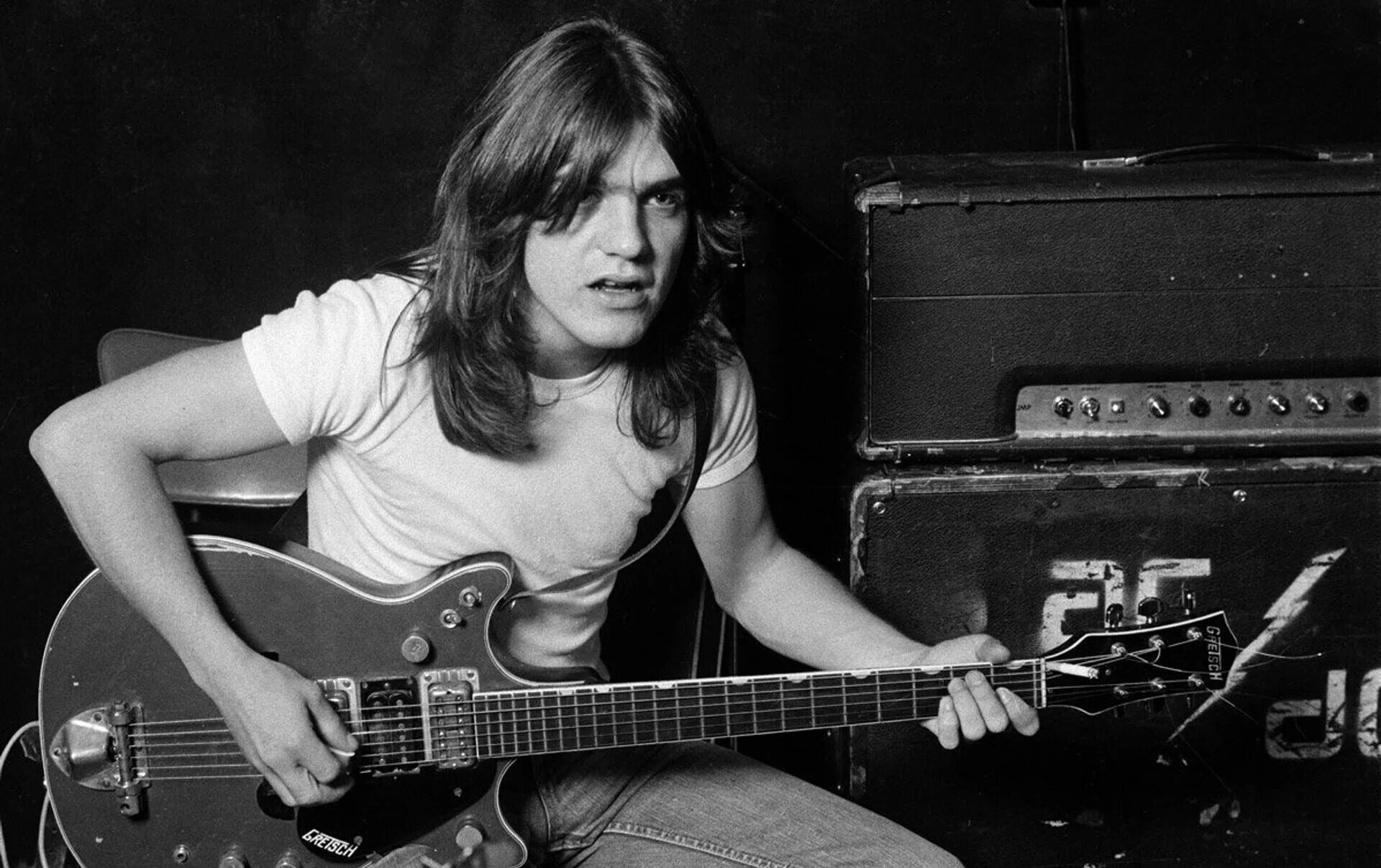 Малькольм AC DC. Malcolm young в молодости. Гитарист группы AC DC малькальмьян фотографии. AC DC Malcolm young.