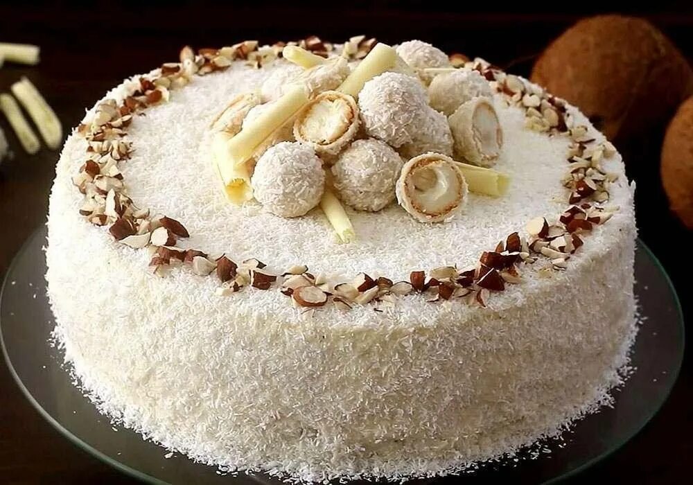 День кокосового торта. Кокосовый торт Рафаэлло. Бисквитный торт Рафаэлло. Торт Рафаэлло Cake. Торт Рафаэлло с кокосовой стружкой и миндалем.