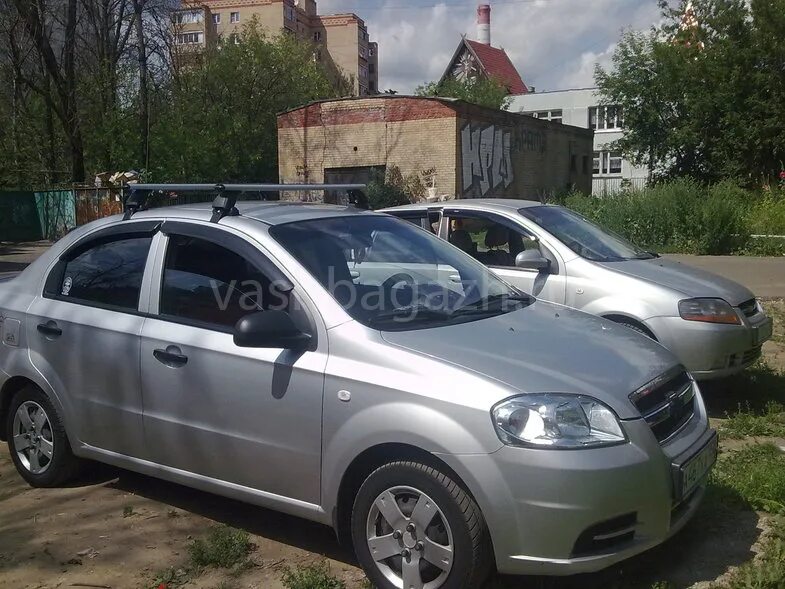 Купить багажник авео шевроле. Рейлинги на Шевроле Авео т250 седан. Багажник на крышу Шевроле Авео т250 седан. Chevrolet Aveo t250 седан багажник на крышу. Шевроле т255 Авео багажник на крыше.