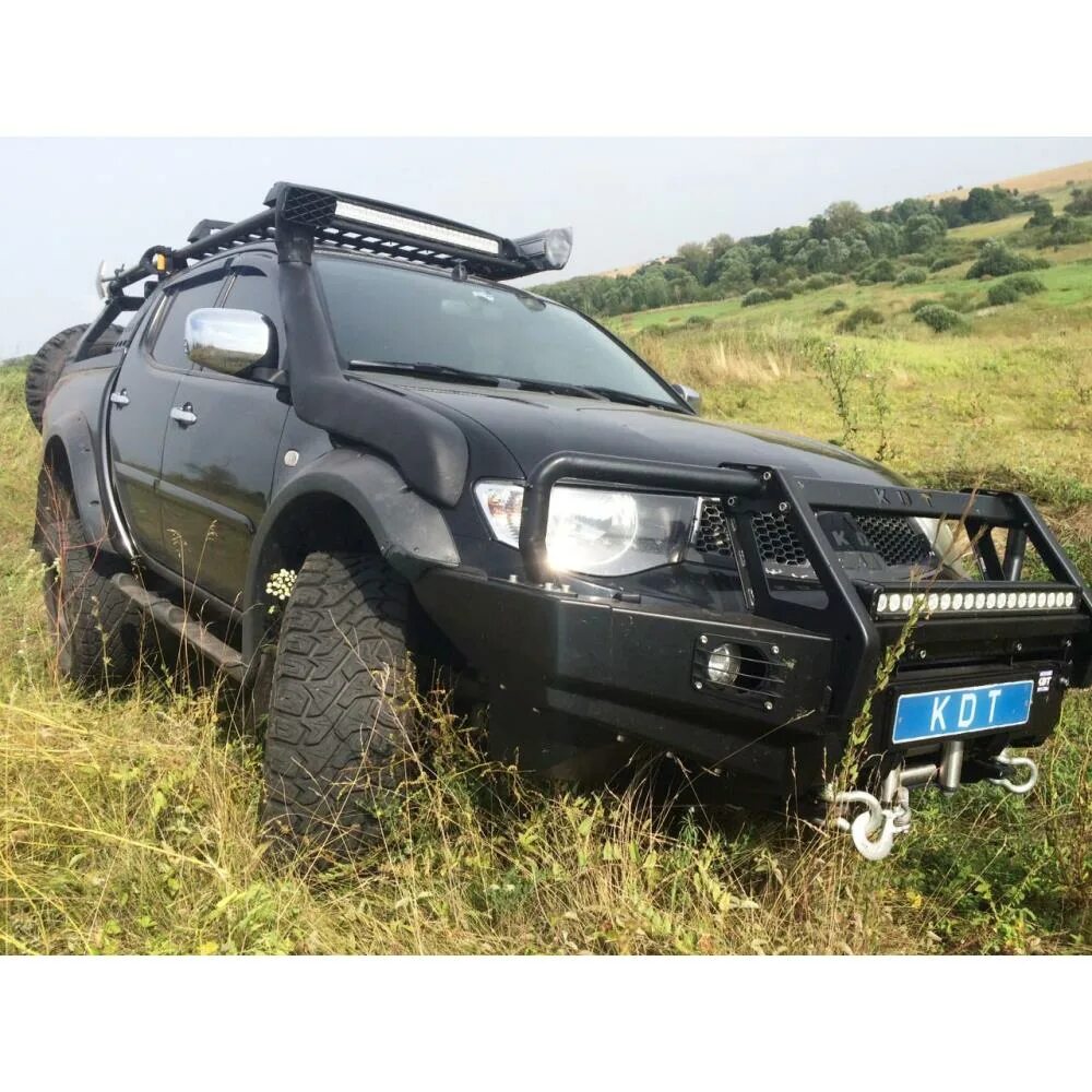 Бампера mitsubishi l200. Бампер силовой Митсубиши l 200. Силовой бампер KDT l200. КДТ l200 бампер. Митсубиси л200 с кенгурятником.