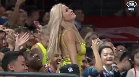 TV commentator loses train of thought as sexy Brazil fan dances in crowd at...