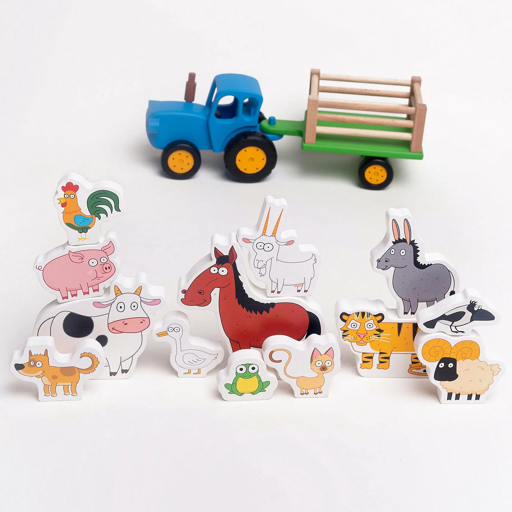 Покажи игрушку синий трактор. Покажи игрушку синий трактор. Игрушка синий трактор гоша с прицепом wooden toys 1635t. Трактор гоша игрушка. Озон синий трактор.