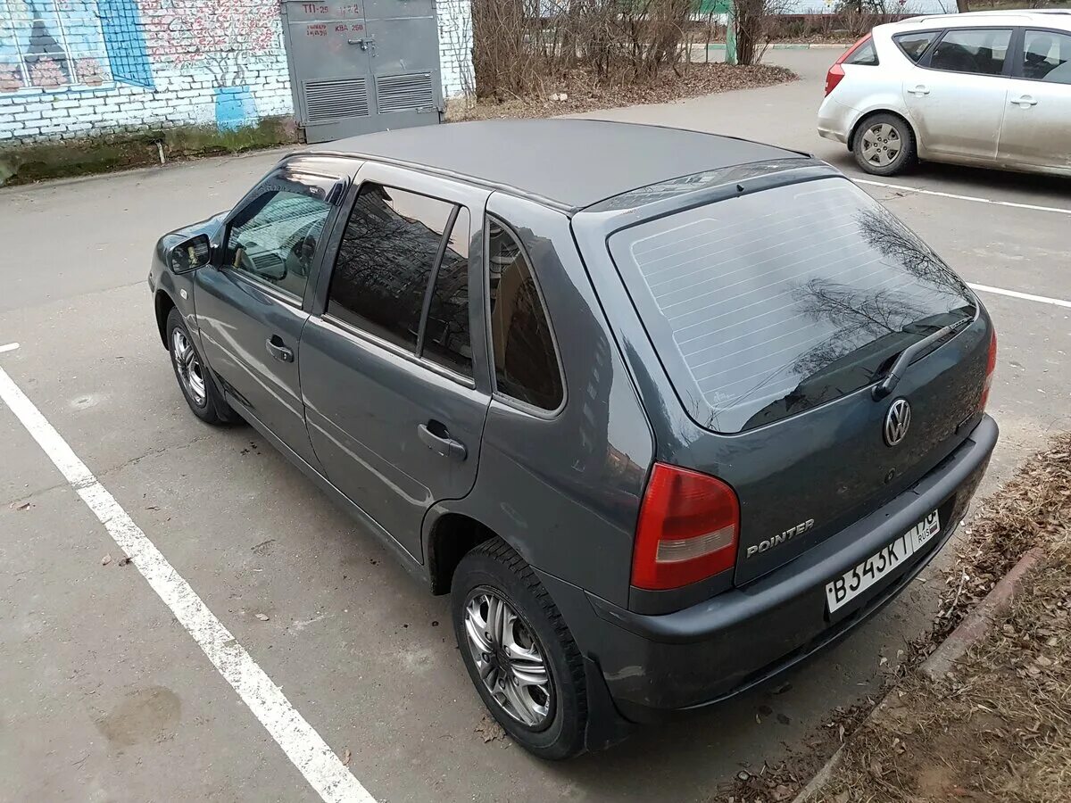 Фольксваген пойнтер купить. Volkswagen Pointer серый. Фольксваген Пойнтер 2004 1.8. Volkswagen Pointer 2005 спойлер. Фольксваген Пойнтер 2005.