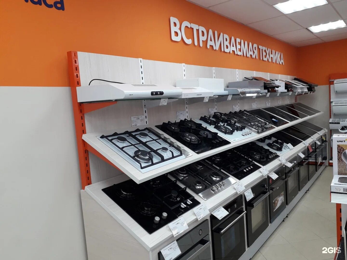 ставрополь ортц днс. привезли бытовую технику оптом на машине. стиральные машины на полках магазина. бытовая техника ставрополь магазины. магазин компьютерной техники.