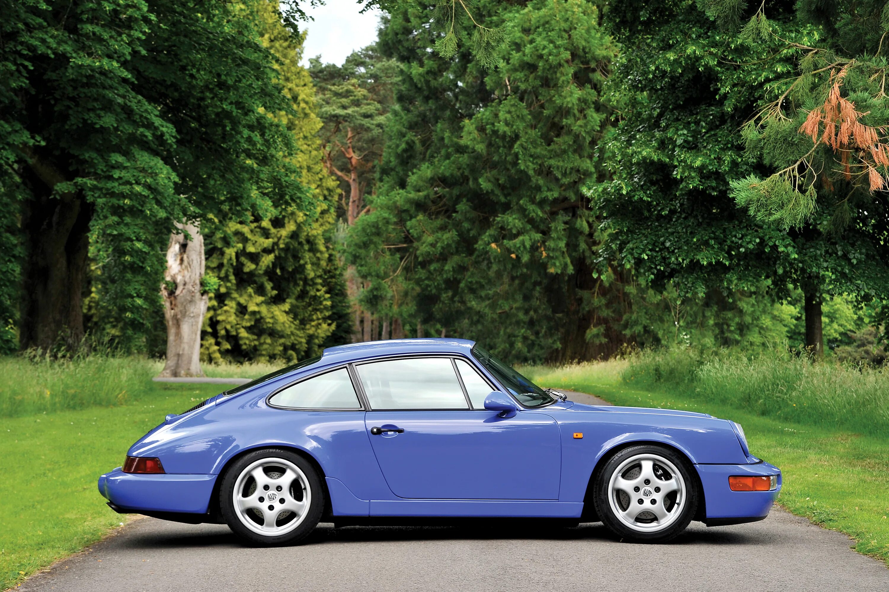 Порше сбоку. Порше 911 сбоку. porsche 911 carrera 964. порше 911 93. порше каррера 911 1991.