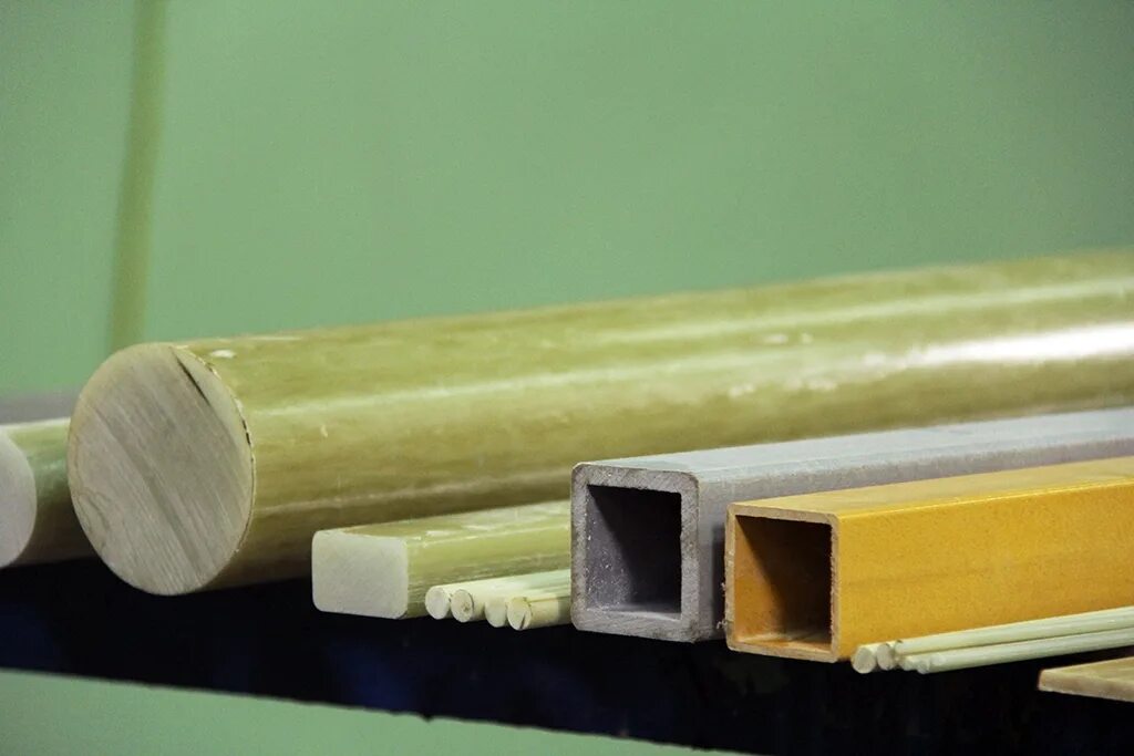 пултрузия стеклопластика. конструкционные стеклопластики. полимерный композитный пултрузионный профиль. конструкционные стеклопластики. пултрузия стеклопластика профиль.