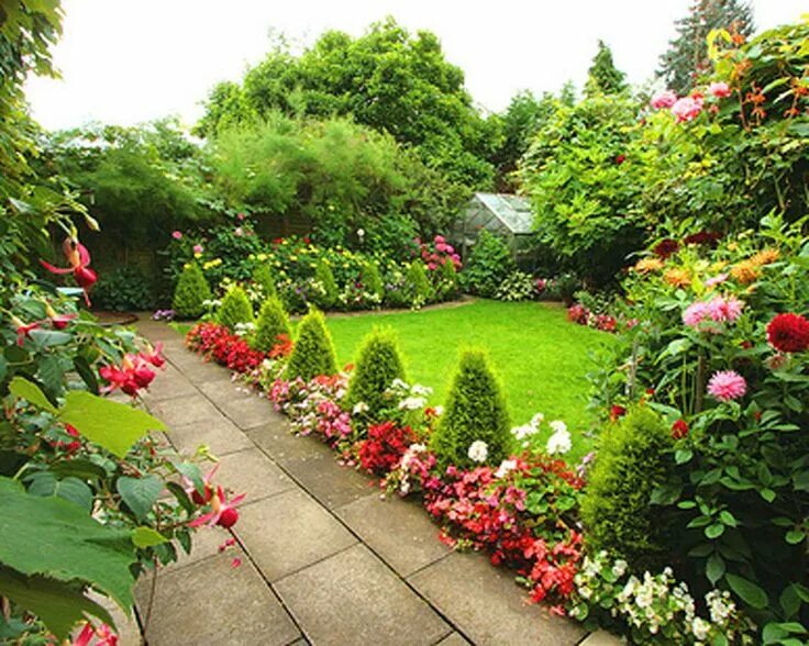 A garden path worth exploring down replete with purples, pinks, and maroons. See