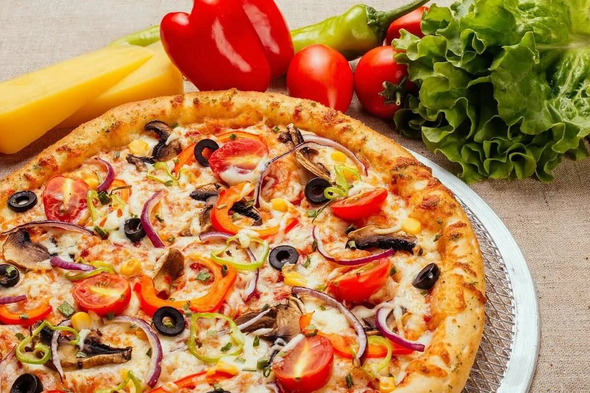 Доставка пиццерия пиццы. Пицца Вегетарианская. Пицца овощная. Пицца с овощами. Пицца с маслинами.
