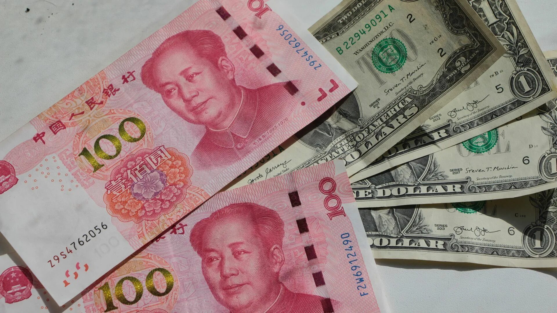 200 000 юаней. Китайский юань. Иностранная валюта. Юань (валюта). Доллар (валюта).