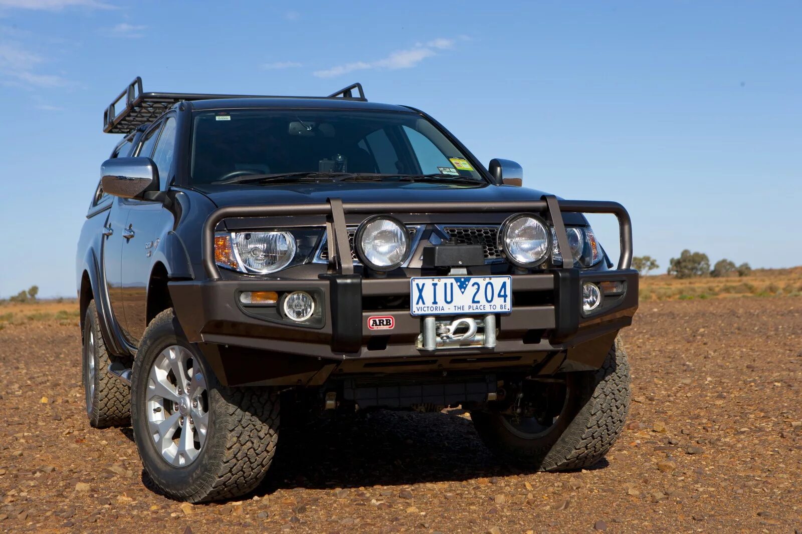 Бампера mitsubishi l200. Силовой бампер ARB l200. Силовой бампер л200 ARB. Передний силовой бампер ARB Mitsubishi l200. Бампер ARB силовой на Митсубиси l200.