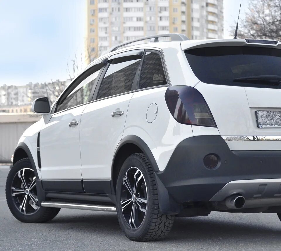 Сравним сток и не сток (Антара на улицах разных городов) - Opel Antara, 3,2 л, 2