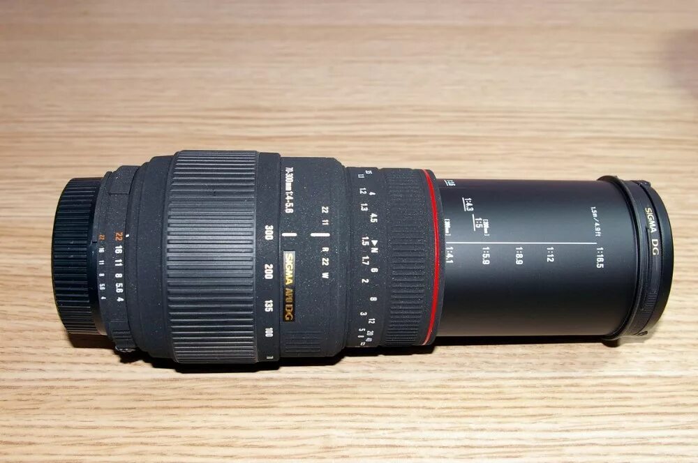 Sigma dg 300mm. Sigma 70-300mm Canon. Sigma 70-300mm f4-5.6 apo DG macro. Объектив Sigma 70-300mm 1:4-5.6 apo DG. Сигма ДГ 70 300 объектив.