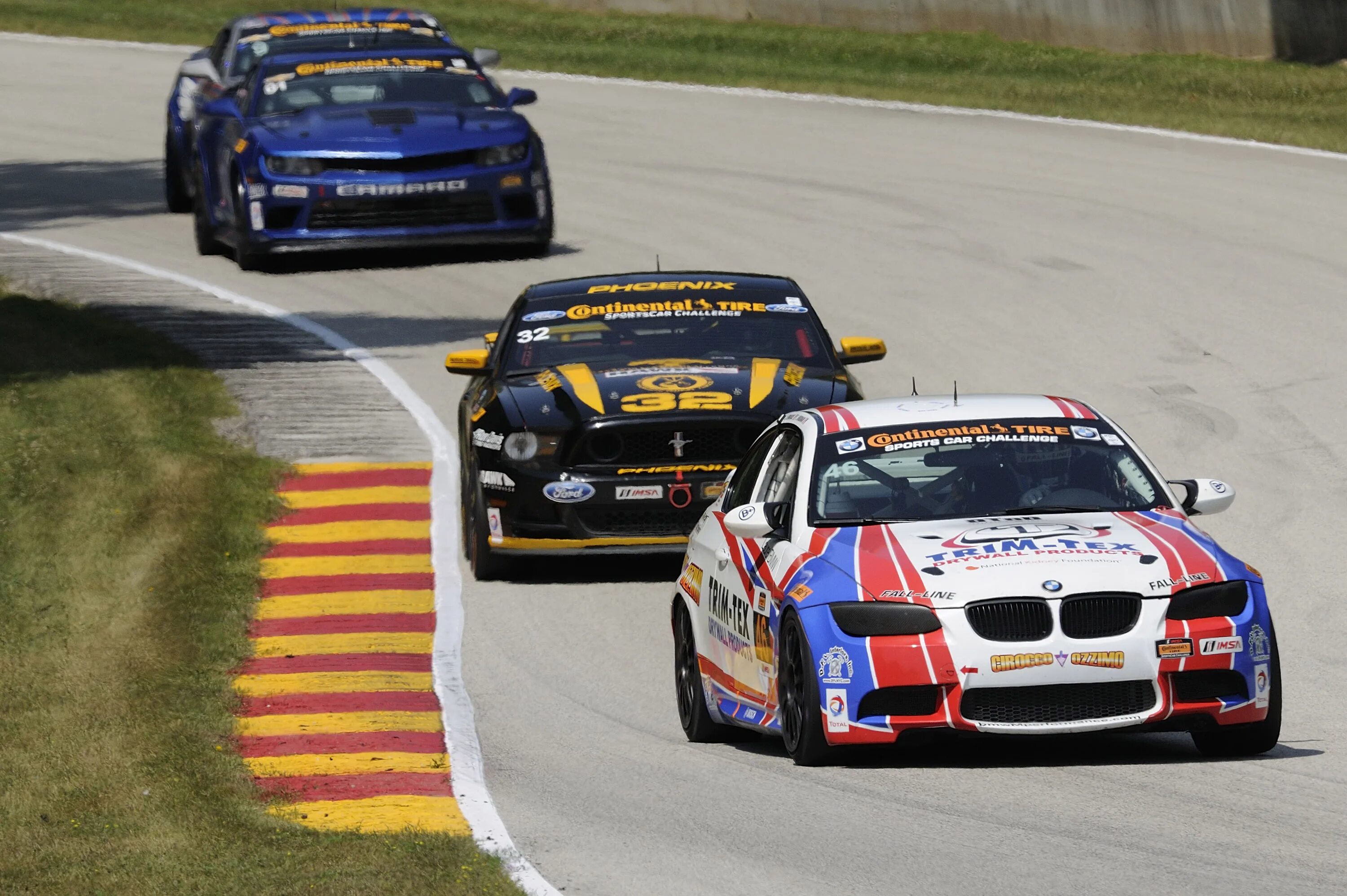 BMW гонки. БМВ гонка. БМВ на гонках. Road America гонка.