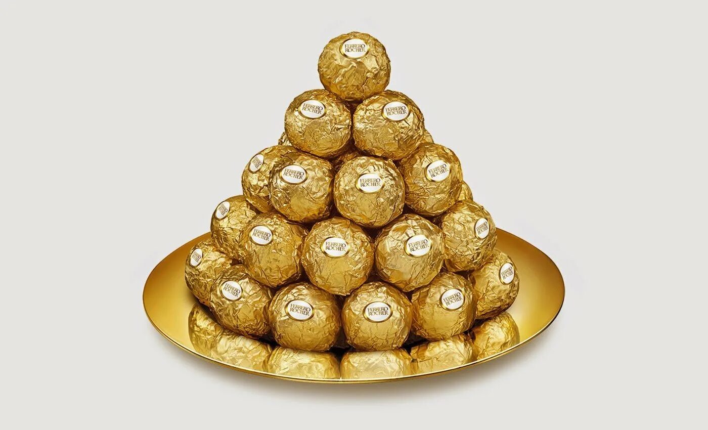 Ферреро Роше. Ferrero Rocher пирамида. Ferrero Rocher шоколад. Золотые конфеты Ферреро Роше. Кондитерская золотые конфеты