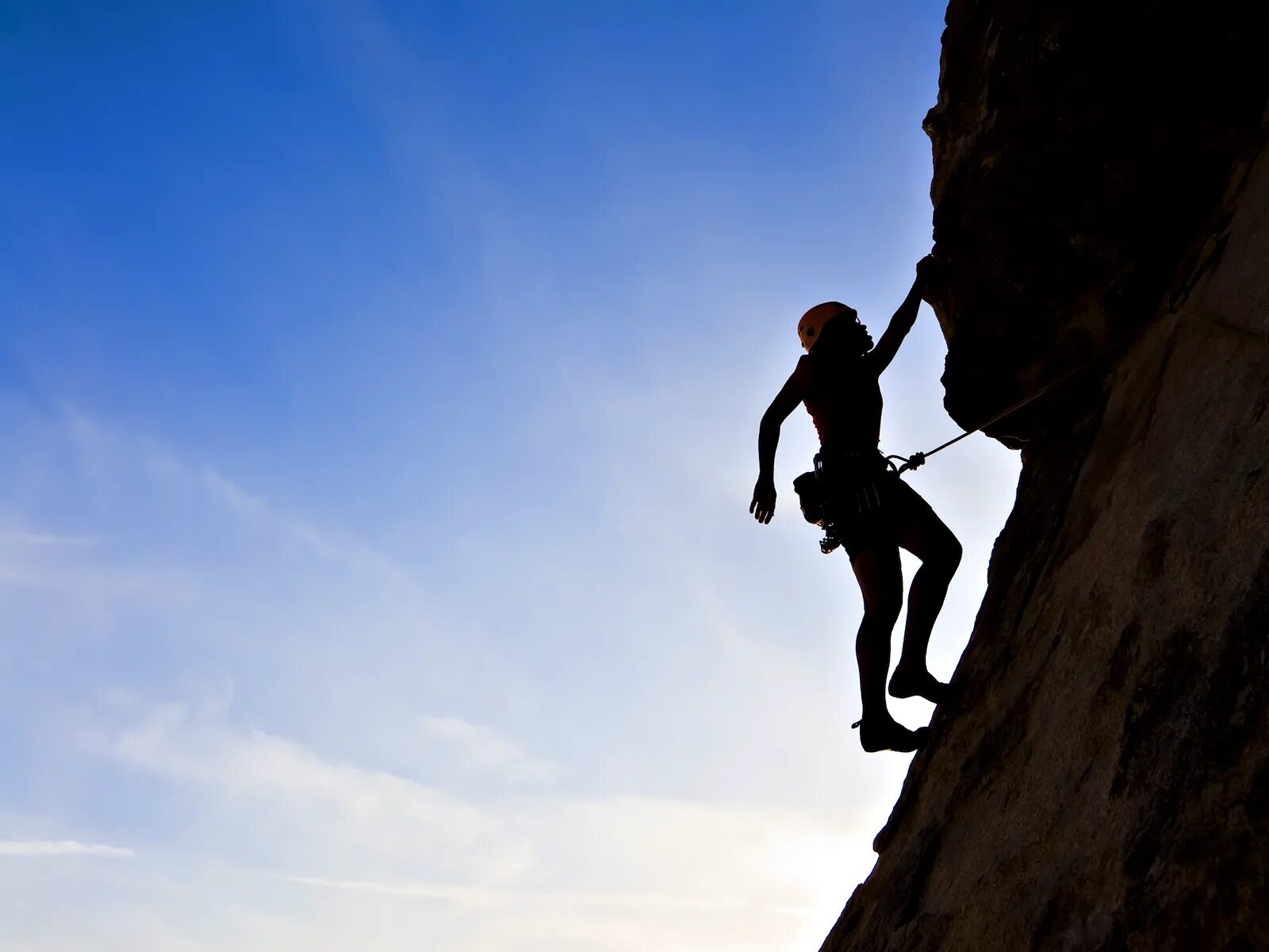 Climb up high. Человек взбирается на гору. Человек карабкается в гору. Человек лезет в гору. Взбираться на гору.