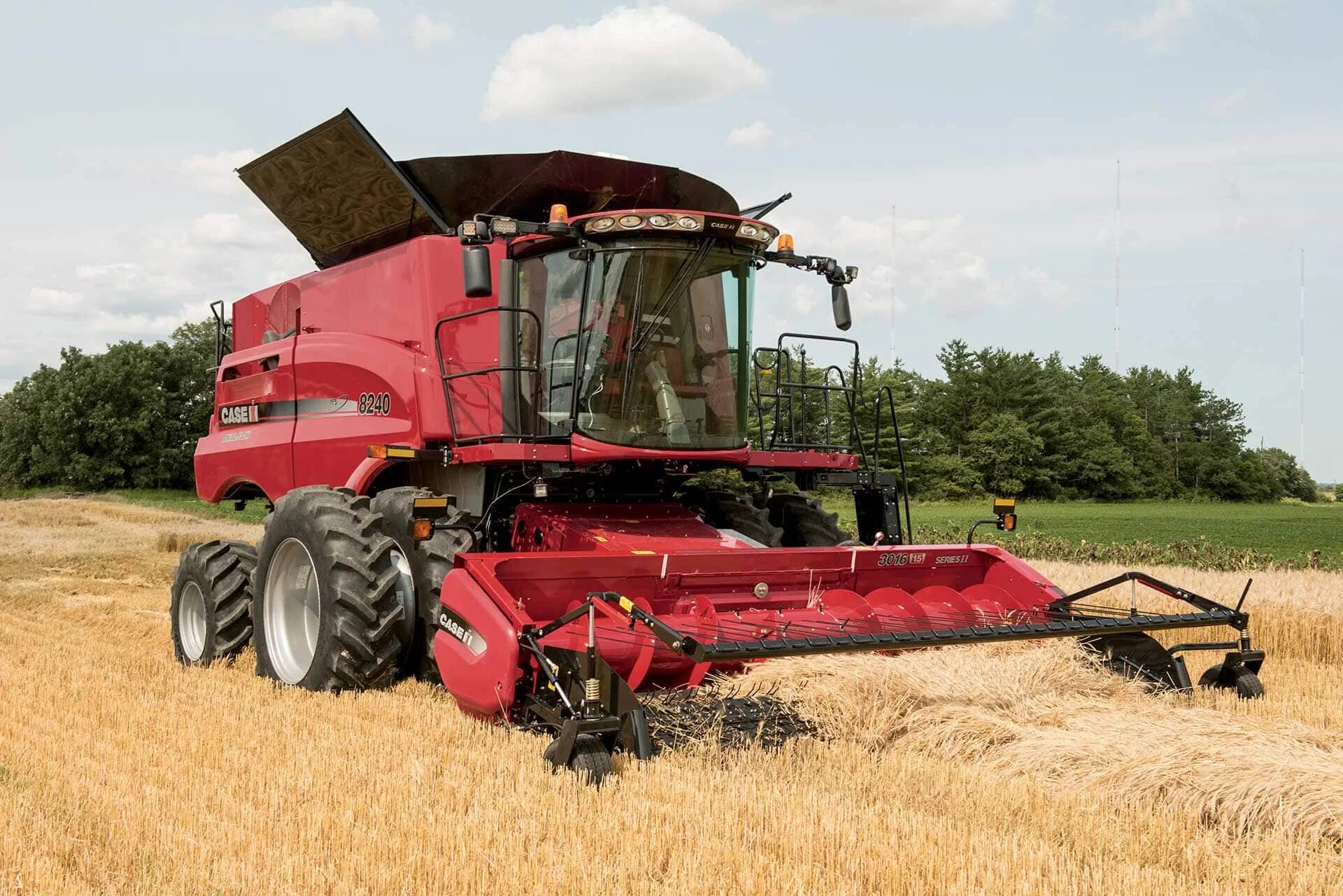 Сх про. Зерноуборочный комбайн кейс 8250. Case IH Axial Flow. Case IH Axial комбайн. Case комбайн 2022.