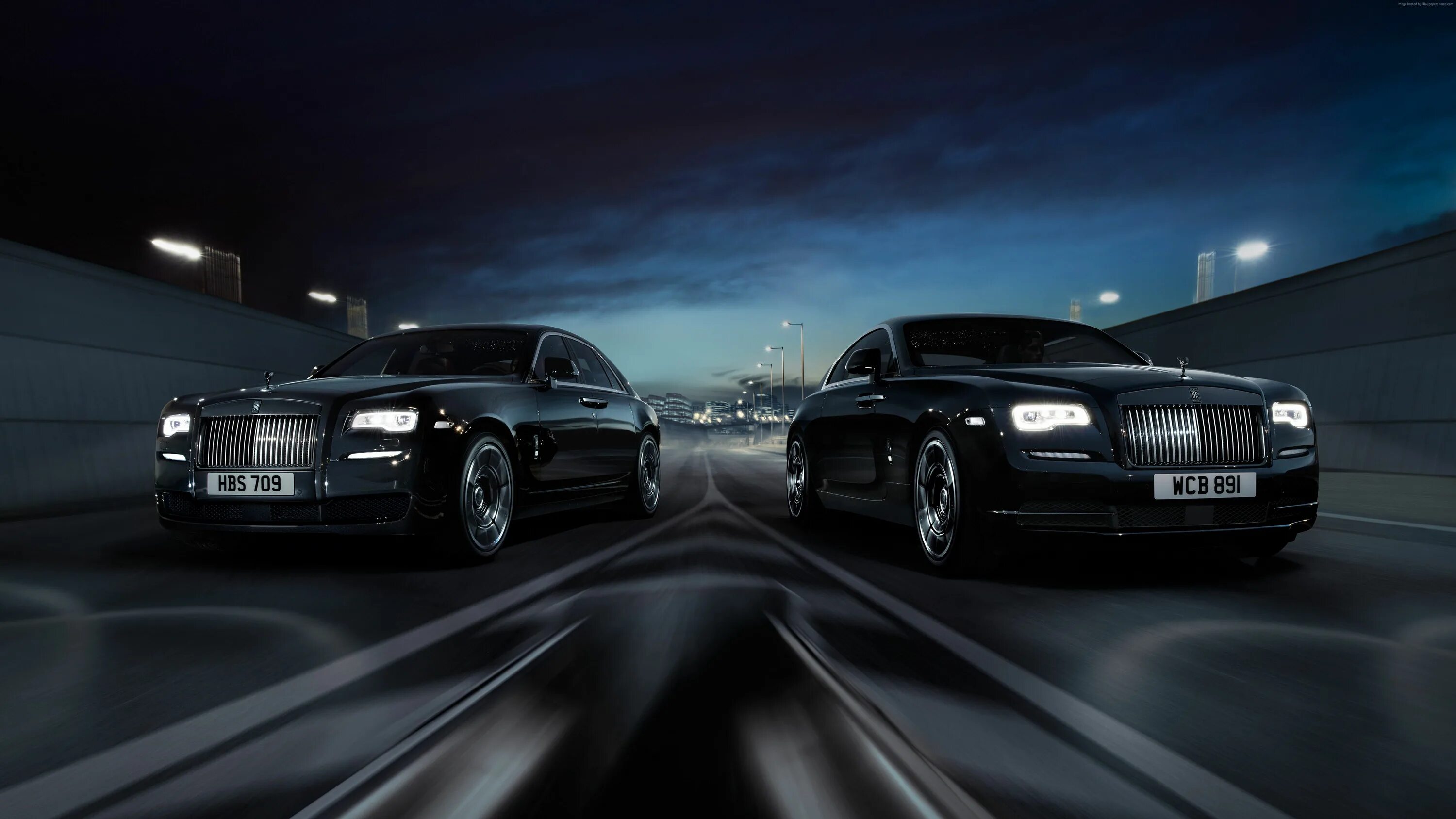 Two rolls. Роллс Ройс черный 2016. Rolls Royce Wraith Black badge. Rolls Royce Wraith 2023. Машина чёрный Роллс Ройс.