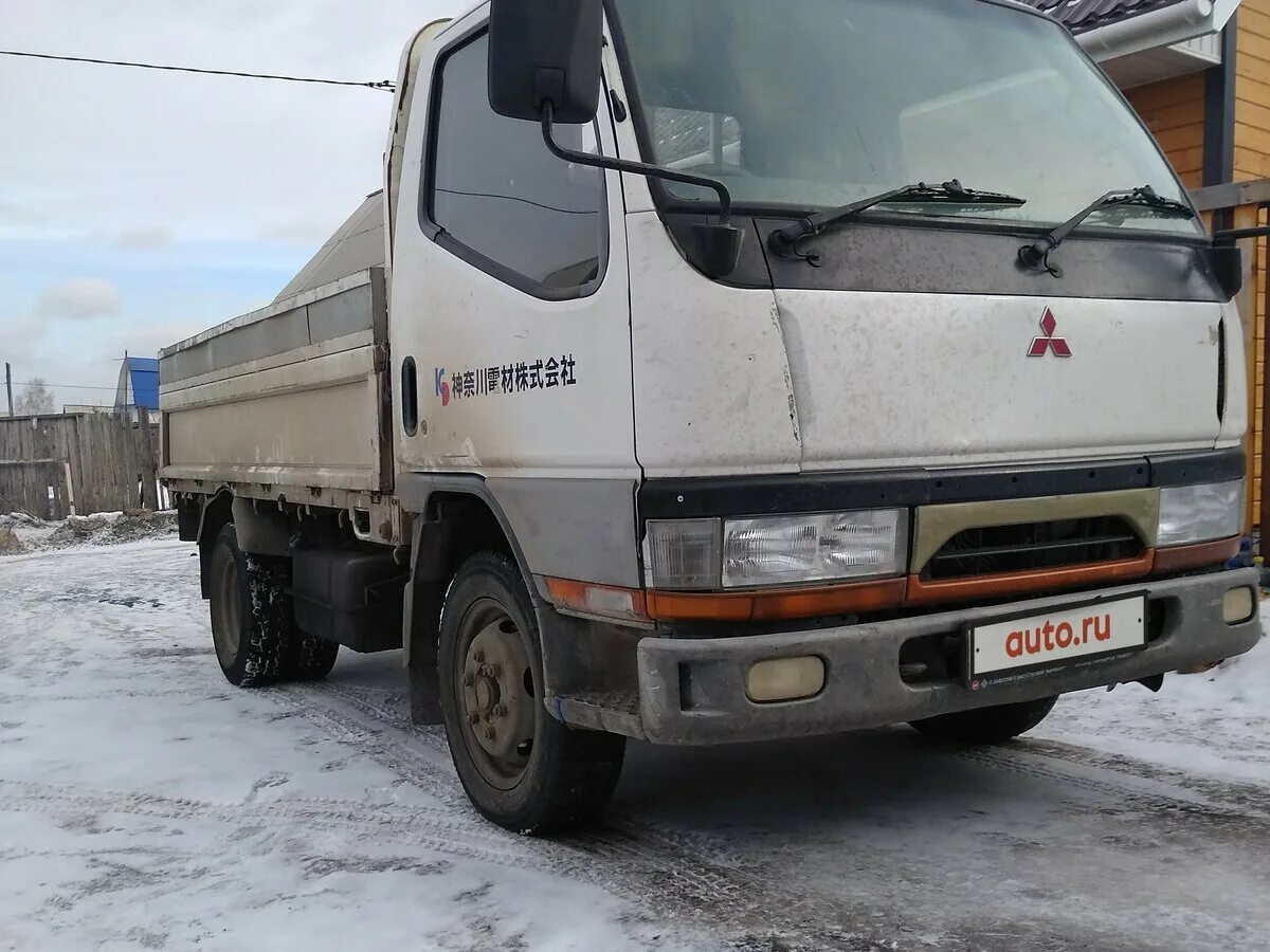 Грузовик митсубиси кантер. Mitsubishi Canter 1995. Mitsubishi Canter бортовой 2-3 тонны. Мицубиси Фусо 1995. Митсубиси Кантер 1995 года.