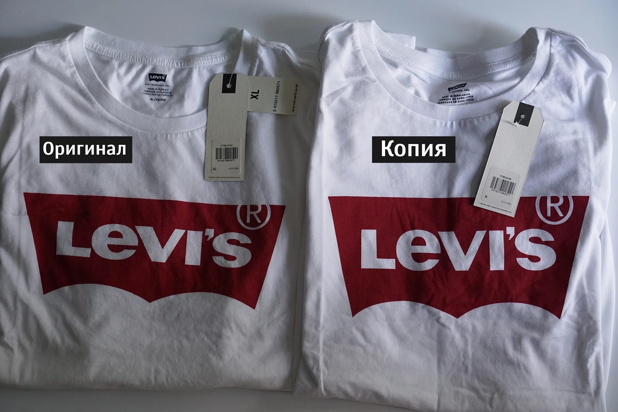 Как отличить guess. Левис оригинальные бирки Levis. Паленая футболка левайс. Футболка Левис оригинал. Майка левайс оригинал.