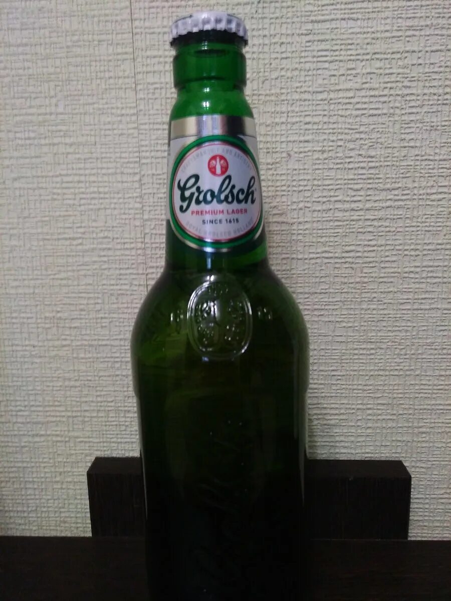 Купить пиво в кб. Нефильтрованное пиво Grolsch. Пиво 0 33 красное белое. Grolsch пиво красное и белое. Пиво красное белое 0.5.