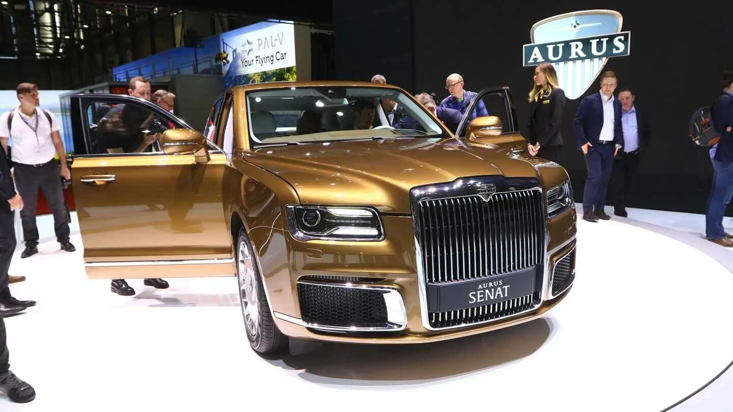 Аурус автомобиль фото производитель. Золотой аурус сенат. машина аурус сенат l600. машина аурус производитель. аурус сенат водородный.