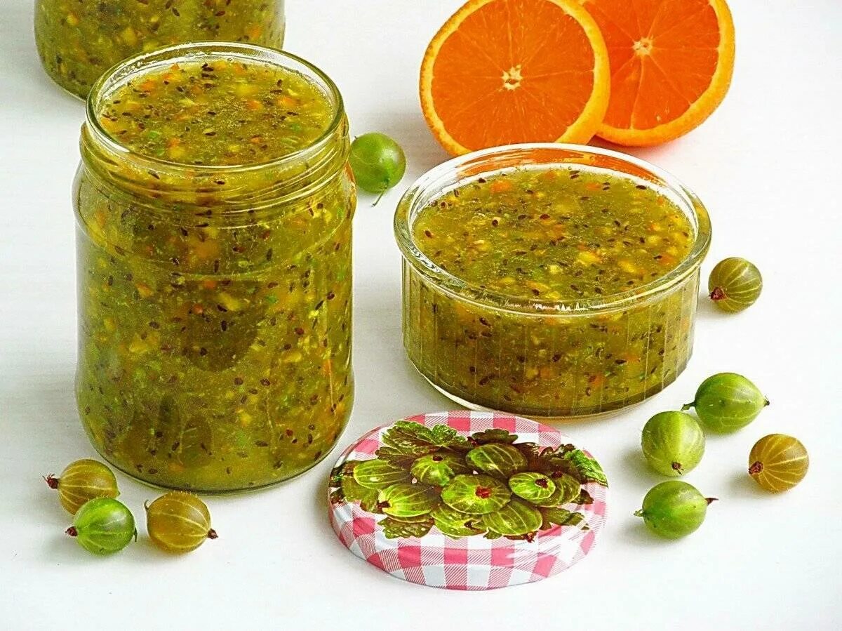 Перекрученный крыжовник. Варенье из крыжовника с апельсином. варенье крыжовник с апельсином. крыжовниковое варенье с апельсинами. крыжовник джем с апельсином.