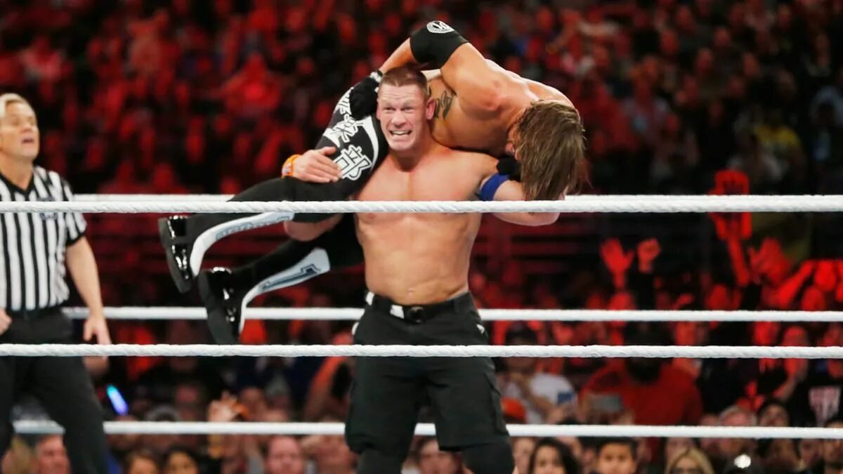 Джон сина рестлер. Дуэйн джонсон vs джон сина. Wwe john cena vs. John cena 2009. Wwe john cena vs aj styles vs bryt waytt.
