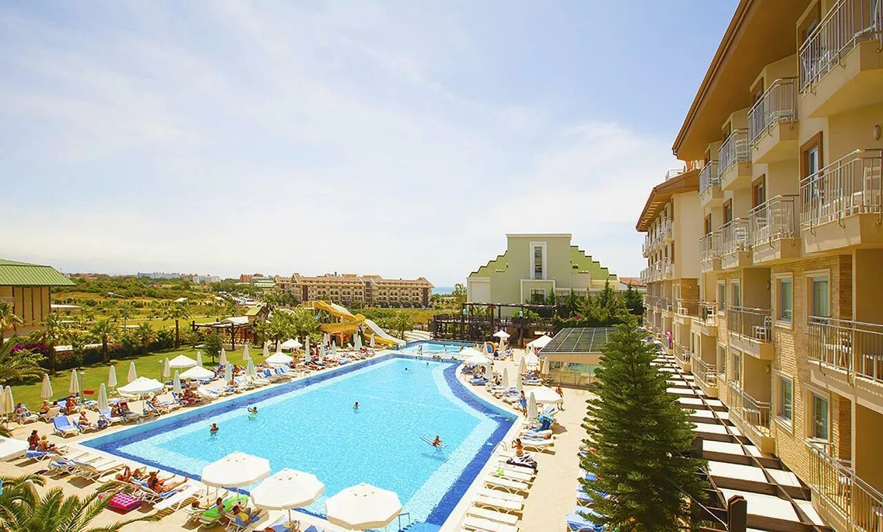 Iz flower side beach hotel 4. Из фловер сиде бич отель 4 турция сиде. Отель luca beach hotel 4 турция сиде. Сиде сан бич хотель 5* турция. Отель luca beach hotel 4 турция сиде.