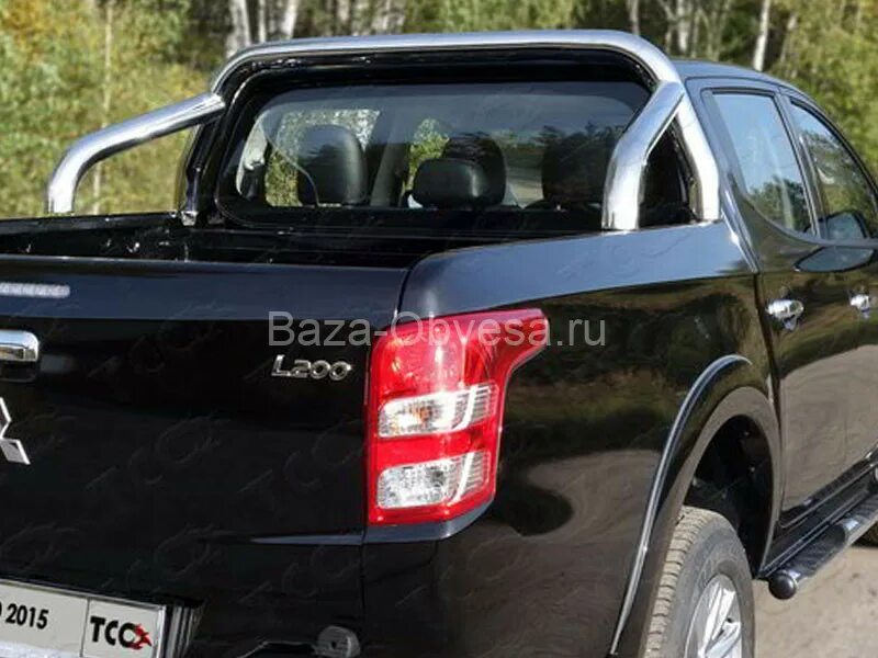 Пикап защита. Mitsubishi l200 дуга в кузов. Дуги в кузов Митсубиси л200. Дуги на l200 Mitsubishi. Дуга металлическая Мицубиси l200.