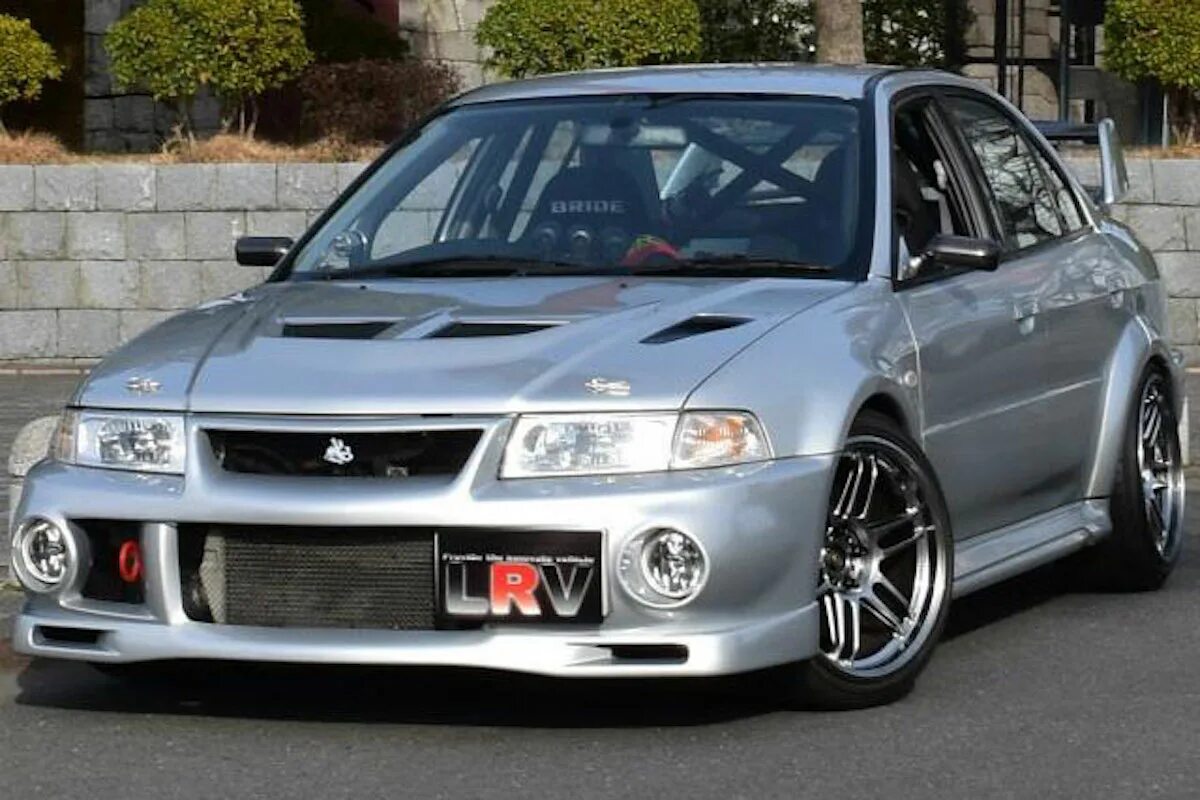 Мицубиси 1999г. Mitsubishi Lancer 1999. Mitsubishi Lancer Evolution 1999. Mitsubishi Lancer 1999 EVO 6. Mitsubishi "Lancer" vi 2000.